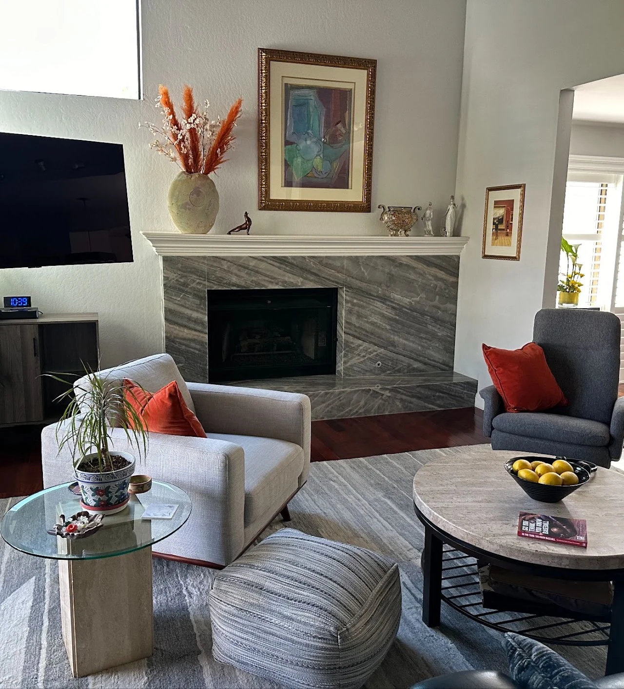 Living room seating arranged around a fireplace